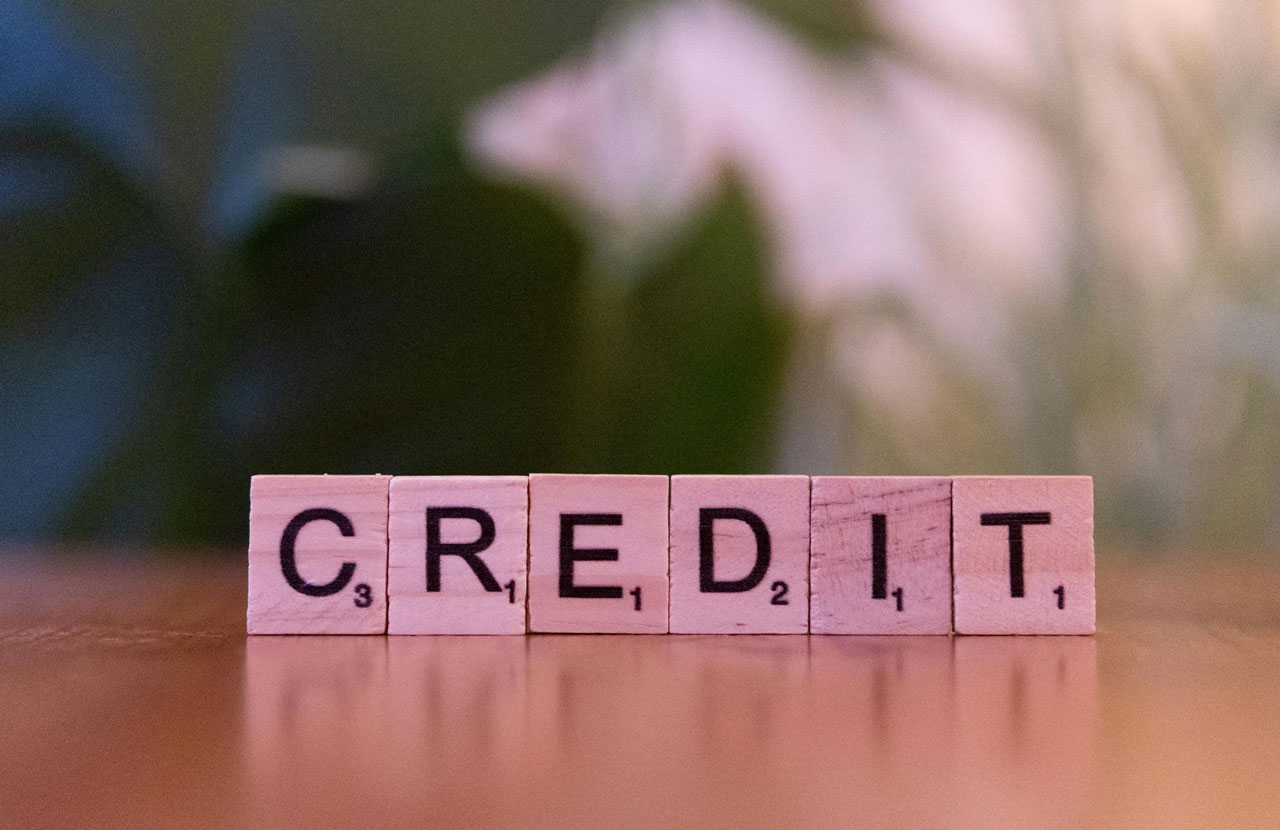 Block letters spelling credit